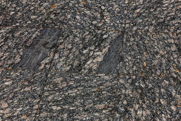 花崗岩の背景のテクスチャです 自然のナチュラルグラ ニット表面パターンの背景として 自然のナチュラルグラ ニット 砂利石背景な抽象的な面の石壁 自然石を扱われ 建築を飾るため黒と灰色の斑点があります — ストック写真