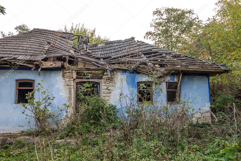 ODESSA, UKRAINE, 6 October 2014: Old house in Ukrainian village. Endangered agriculture, abandoned houses. Government is not engaged in problems of  village. Poor depressed area