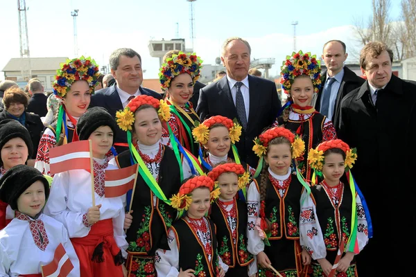 ODESSA, UKRAINE - June 6, 2014: official visit to Ukraine, Odessa President of Latvia Andris Berzins. Solemn meeting at the airport. The plane of the President. Attributes of Latvia - Latvian flag