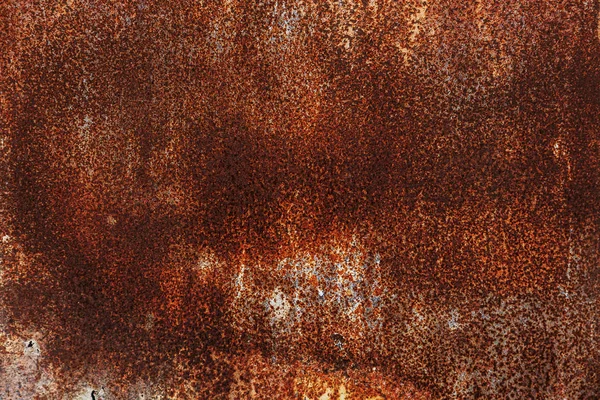 Corroded white metal background. Rusted white painted metal wall. Rusty metal background with streaks of rust. Rust stains. The metal surface rusted spots. Rysty corrosion