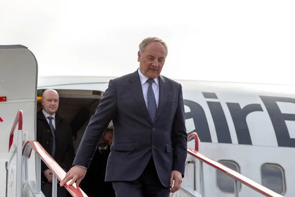 ODESSA, UKRAINE - June 6, 2014: official visit to Ukraine, Odessa President of Latvia Andris Berzins. Solemn meeting at the airport. The plane of the President. Attributes of Latvia - Latvian flag