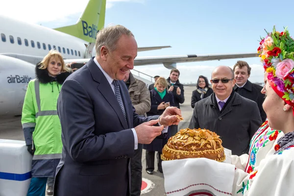 ODESSA, UKRAINE - June 6, 2014: official visit to Ukraine, Odessa President of Latvia Andris Berzins. Solemn meeting at the airport. The plane of the President. Attributes of Latvia - Latvian flag