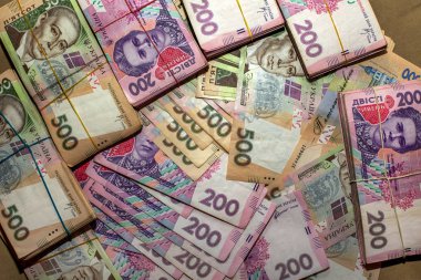 Birçok Ukraynalı para hryvnia. Kelepçe para. Ukrayna yolsuzluk. Yolsuzlukla mücadele. Yolsuzluk hükümet ve ülke işinde fiziksel kanıt