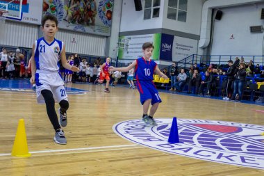 Odessa, Ukrayna - 23 Aralık 2018: genç çocuk basketbol oynamak, Çocuk spor yarışmalarında kutlama çocuk spor basketbol kulübü çocuk spor okul sırasında katılmak