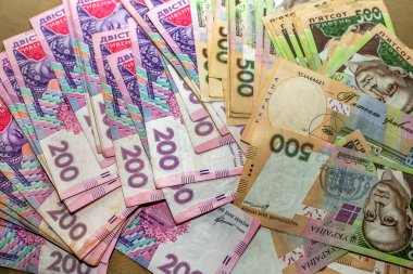 Birçok Ukraynalı para hryvnia. Kelepçe para. Ukrayna yolsuzluk. Yolsuzlukla mücadele. Yolsuzluk hükümet ve ülke işinde fiziksel kanıt