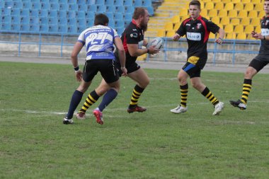 Odessa, Ukrayna - 29 Eylül 2018: Final Oyunları Şampiyonası Ukrayna'nın en güçlü takımları Rugby-7. Rugby topu alan üzerinde. Rugby topu için ağır mücadele sahip. Takım sporcular oyuncular sahada