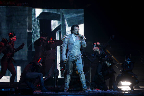 Odessa, Ukraine, April 17 2012: Pop concert iconic Russian singer Philip Kirkorov in Odessa. Bright colorful light and theatrical show with the full house.