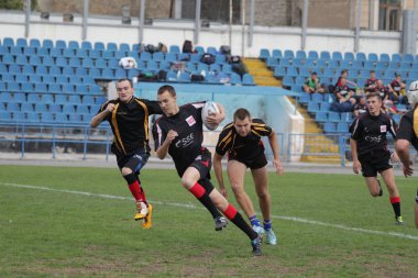 Odessa, Ukrayna - 29 Eylül 2018: Final Oyunları Şampiyonası Ukrayna'nın en güçlü takımları Rugby-7. Rugby topu alan üzerinde. Rugby topu için ağır mücadele sahip. Takım sporcular oyuncular sahada
