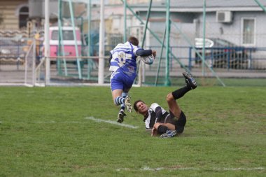 Odessa, Ukrayna - 29 Eylül 2018: Final Oyunları Şampiyonası Ukrayna'nın en güçlü takımları Rugby-7. Rugby topu alan üzerinde. Rugby topu için ağır mücadele sahip. Takım sporcular oyuncular sahada