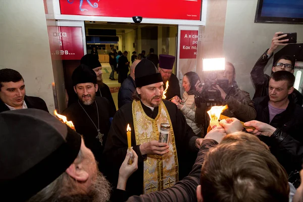 Odessa, Ukraine - April 11, 2015: Easter, parishioners of the Orthodox Church of the Holy Fire from Jerusalem at the feast of the Resurrection of Christ. Orthodox Easter