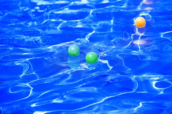 Modern Blue Water Pool Floating Multi Colored Plastic Balls Presentation — Stock Photo, Image