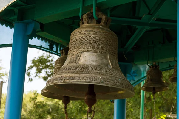 Russian orthodox bronze bells of belfry of Orthodox Christian Church of St. Ilya in zone of alienation of nuclear disaster in Chernobyl, Ukraine. Ancient bells of bell tower of temple