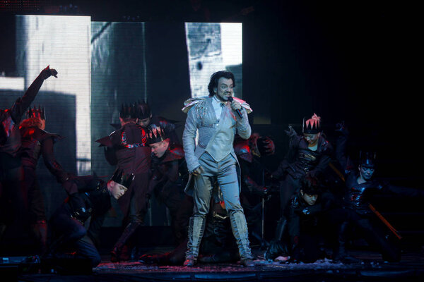 Odessa, Ukraine, April 17 2012: Pop concert iconic Russian singer Philip Kirkorov in Odessa. Bright colorful light and theatrical show with the full house.