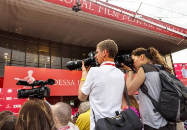 Odessa, Ukraine - July 10, 2015: Red carpet opening of the 6th International Film Festival Odessa. Worked as a photographer. Many spectators and paparazzi greeted glamorous guests.