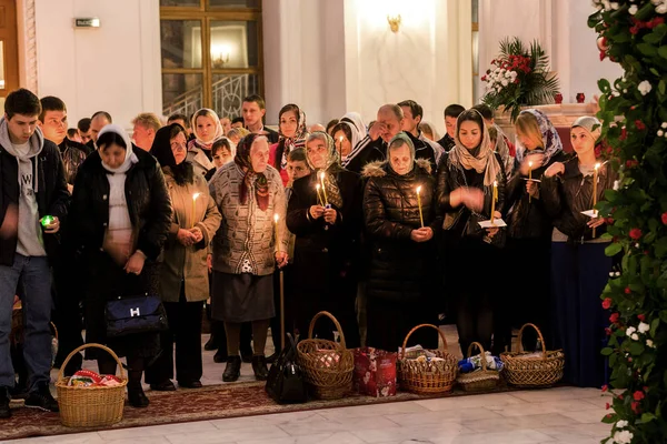 Odessa, Ukraine - April 11, 2015: Easter, parishioners of the Orthodox Church. Holy Fire from Jerusalem at the feast of the Resurrection of Christ. Orthodox Christian Easter