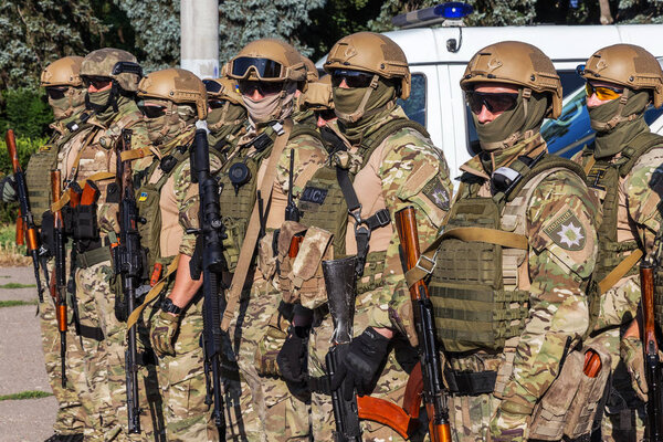 ODESSA, UKRAINE - August 1, 2018: Special forces of the Ukrainian police in the ranks in full combat form with special weapons. Urkainain special forces of the rapid reaction police, anti-terror troops