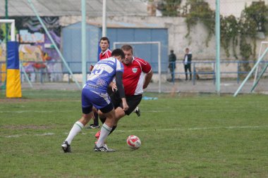 Odessa, Ukrayna - 29 Eylül 2018: Final Oyunları Şampiyonası Ukrayna'nın en güçlü takımları Rugby-7. Rugby topu alan üzerinde. Rugby topu için ağır mücadele sahip. Takım sporcular oyuncular sahada
