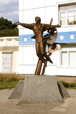 bronze monument to the famous Russian bard, poet, composer, actor, singer in Odessa on the French Boulevard near the Odessa film studio. The legendary singer of USSR Vladimir Semyonovich Vysotsky clipart
