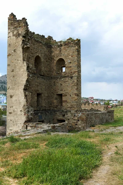 The ruins of the ancient Turkish fortress in Crimea, Sudak. The ruins of the ancient city. The fortress on the cliffs. Ruined wall of ancient medieval fortress. Remains of an ancient fortress