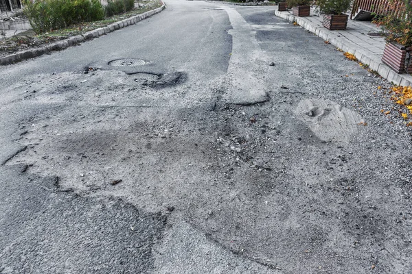 Damaged Asphalt Road Potholes Caused Freezing Thawing Cycles Winter Poor — Stock Photo, Image