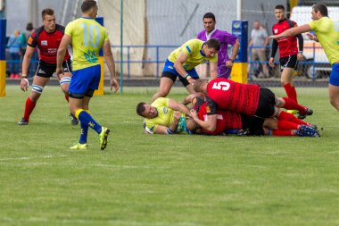 Odessa, Ukrayna - 15 Mayıs 2016: Yarı final UEFA Kupa Rugby. Ukrayna ekibi ile Moldova arasındaki gergin oyun. Avrupa Kupası Rws IRB gümüş madalya için savaş