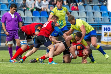 Odessa, Ukrayna - 15 Mayıs 2016: Yarı final UEFA Kupa Rugby. Ukrayna ekibi ile Moldova arasındaki gergin oyun. Avrupa Kupası Rws IRB gümüş madalya için savaş