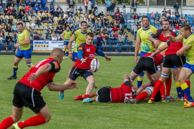 Odessa, Ukrayna - 15 Mayıs 2016: Yarı final UEFA Kupa Rugby. Ukrayna ekibi ile Moldova arasındaki gergin oyun. Avrupa Kupası Rws IRB gümüş madalya için savaş