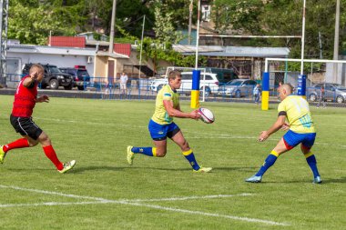 Odessa, Ukrayna - 15 Mayıs 2016: Yarı final UEFA Kupa Rugby. Ukrayna ekibi ile Moldova arasındaki gergin oyun. Avrupa Kupası Rws IRB gümüş madalya için savaş