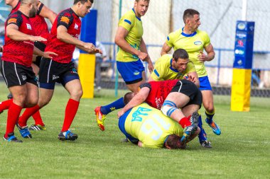 Odessa, Ukrayna - 15 Mayıs 2016: Yarı final UEFA Kupa Rugby. Ukrayna ekibi ile Moldova arasındaki gergin oyun. Avrupa Kupası Rws IRB gümüş madalya için savaş
