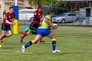 Odessa, Ukrayna - 15 Mayıs 2016: Yarı final UEFA Kupa Rugby. Ukrayna ekibi ile Moldova arasındaki gergin oyun. Avrupa Kupası Rws IRB gümüş madalya için savaş