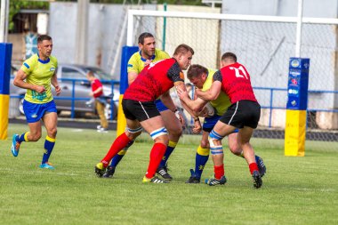 Odessa, Ukrayna - 15 Mayıs 2016: Yarı final UEFA Kupa Rugby. Ukrayna ekibi ile Moldova arasındaki gergin oyun. Avrupa Kupası Rws IRB gümüş madalya için savaş
