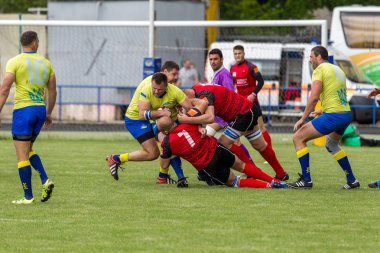 Odessa, Ukrayna - 15 Mayıs 2016: Yarı final UEFA Kupa Rugby. Ukrayna ekibi ile Moldova arasındaki gergin oyun. Avrupa Kupası Rws IRB gümüş madalya için savaş