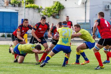 Odessa, Ukrayna - 15 Mayıs 2016: Yarı final UEFA Kupa Rugby. Ukrayna ekibi ile Moldova arasındaki gergin oyun. Avrupa Kupası Rws IRB gümüş madalya için savaş