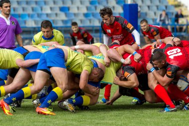 Odessa, Ukrayna - 15 Mayıs 2016: Yarı final UEFA Kupa Rugby. Ukrayna ekibi ile Moldova arasındaki gergin oyun. Avrupa Kupası Rws IRB gümüş madalya için savaş