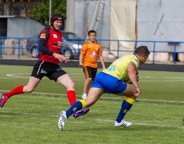 Odessa, Ukrayna - 15 Mayıs 2016: Yarı final UEFA Kupa Rugby. Ukrayna ekibi ile Moldova arasındaki gergin oyun. Avrupa Kupası Rws IRB gümüş madalya için savaş
