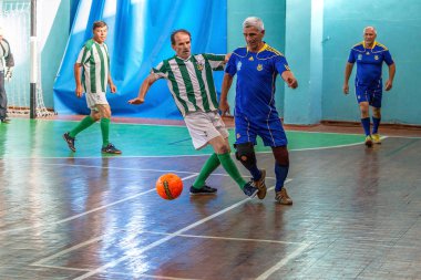 Odessa, Ukrayna -11 Eylül 2016: mini-futbol spor, sporcular büyük 60 + ve 40 + gazileri arasında Ukrayna Kupası. Oyun Futsal Şampiyonası puan. Oyunu mini futbol