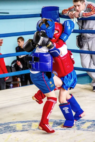 Odessa, Ukraine, April 26, 2015: Cup of Ukraine on Thai boxing among children. Kids boxing, kickboxing children. Children fight with these adult emotions. Popularization of sports and healthy lifestyle