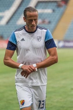 Odessa, Ukrayna - 3 Ağustos 2018: Futbolcular, Fc Djurgardens Eğer İsveç Melkemichel özcan sırasında oyun Uefa Avrupa Ligi 2018 Fc Mariupol (Ukrayna) ile futbol sahada. Futbol oyuncular Tren