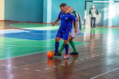 Odessa, Ukrayna -11 Eylül 2016: mini-futbol spor, sporcular büyük 60 + ve 40 + gazileri arasında Ukrayna Kupası. Oyun Futsal Şampiyonası puan. Oyunu mini futbol