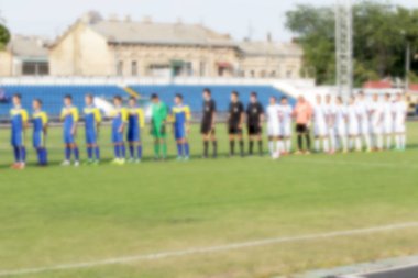 Spor arka plan bulanıklık. Futbol spor poster için zemin olarak bokeh muhteşem oyunu. Futbol oyun tipik sahne arka plan olmadan ekran arka planı için odak bulanık