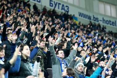 Odessa, Ukrayna - 20 Şubat: Fanlar ve Fc Chernomorets Odessa destekçileri Olympique Lionnais karşı maç sırasında destek takım, 20 Şubat 2014 yılında Odessa