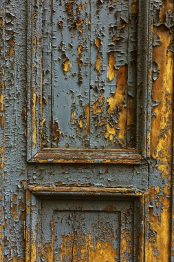 Arka plan doku duvar eski boya peeling ile. Eski ahşap arka plan ağaç eski boya artıkları parçaları kalıntıları ile. Doku eski ağaç bir kurulu ile boya, antika arka plan soyulması boya