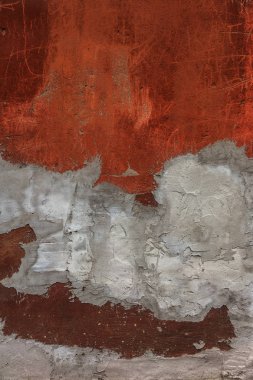 eski sanat dokusuna sıva tuğla duvar. Petal doku ile taş tuğla duvar boyalı sıva çatlaklar boyalı kötü tırmalamak yüzey. Binanın hasarlı sıva arka plan ile ovuşturdu cephe