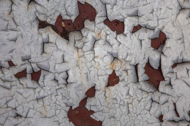 Ahşap kavramsal arka plan. Ahşap kurulların eski boyalı arka plan. Ahşap kalkan soyulması boya izleri eski bir kırık. Antik bir eski boyalı ahşap gürültü kalkan yüzeyi kavramı