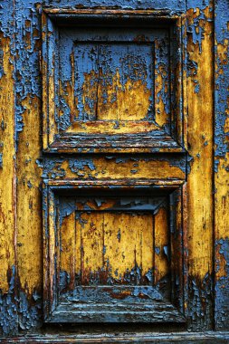 Arka plan doku duvar eski boya peeling ile. Eski ahşap arka plan ağaç eski boya artıkları parçaları kalıntıları ile. Doku eski ağaç bir kurulu ile boya, antika arka plan soyulması boya