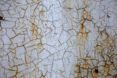 Ahşap kavramsal arka plan. Ahşap kurulların eski boyalı arka plan. Ahşap kalkan soyulması boya izleri eski bir kırık. Antik bir eski boyalı ahşap gürültü kalkan yüzeyi kavramı