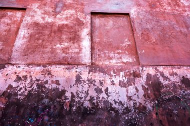 Vintage eski bir çimento taş duvar, yıpranmış ve yaratıcı afiş tasarımı yıpranmış kırık. Çatlaklar, çizik, peeling eski boya ve sıva arka plan üzerinde eski duvar çimento