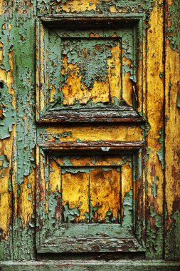 Arka plan doku duvar eski boya peeling ile. Eski ahşap arka plan ağaç eski boya artıkları parçaları kalıntıları ile. Doku eski ağaç bir kurulu ile boya, antika arka plan soyulması boya