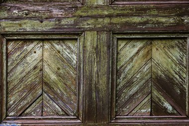 Arka plan doku duvar eski boya peeling ile. Eski ahşap arka plan ağaç eski boya artıkları parçaları kalıntıları ile. Doku eski ağaç bir kurulu ile boya, antika arka plan soyulması boya