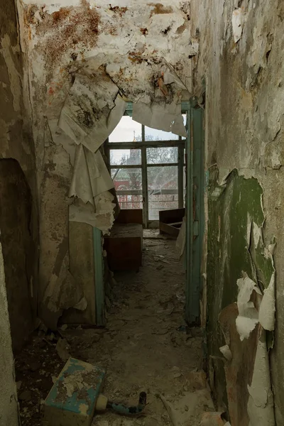 Abandoned house, spooky interior of ruined house with furnished rooms, bardel; Hotel;  meeting house. Old collapsing house; Abandoned house interior. Ruined house in poor residential quarter in slum